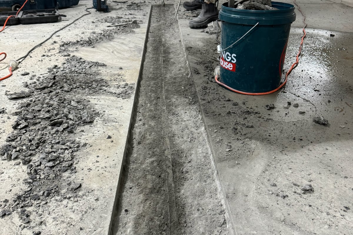 Failed construction joints showing separation and moisture damage